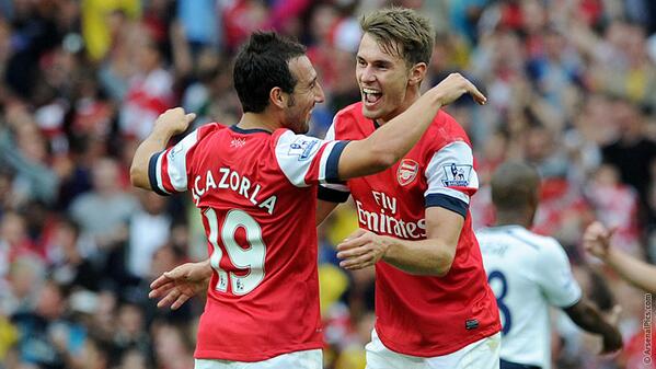 Aaron Ramsey and Santi Carzola Celebrate Arsenal Goal.