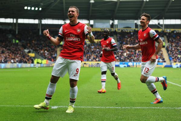 Lukas Podolski Scored a Brace as Arsenal Move Four Points Clear of Fourth-Placed Everton.