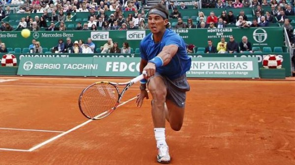 Rafael Nadal Tries a Back-Hand During His Fourth Round Match At the Monte Carlo Open. 