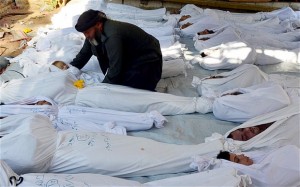 Corpses of victims of last year's gas attack in Damascus