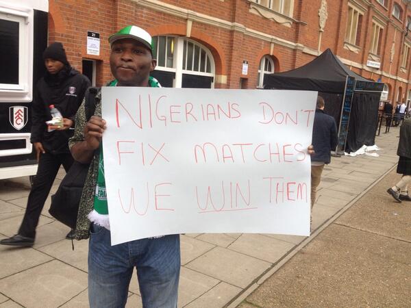 A Nigerian Supporter Echoes Coach Stephen Keshi's Intuitions Prior to Kick-Off at Craven Cottage.