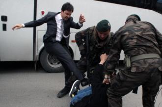 Yerkel kicking a protester Photo: AP