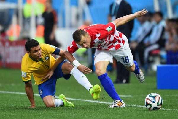 Fred Struggles for the Ball With a Croatian Opponent During the Opening Game of the 2014 World Cup. Getty Image.