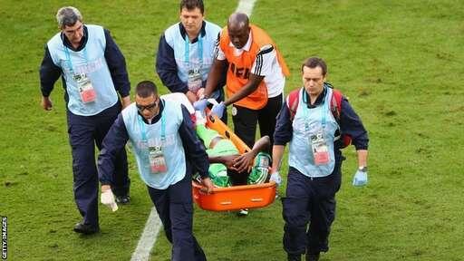 Obaobona Stretchered Off After Being Hit on His Foot With Sharp Studs By an Iranian Forward. Getty image.