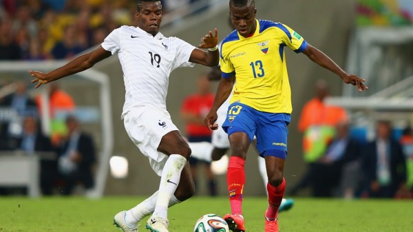 Paul Pogba of France Challenges  Enner Valencia of Ecuador During Their Last Group F Game. Fifa via Getty Image.