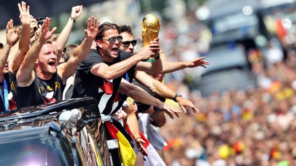 Germany Players In Celebration Mood During Their Victory Parade In Berlin. Image: AFP.