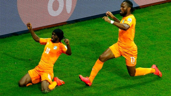 Gervinho Celebrates His Goal Against Japan With Team-Mate Didier Drogba. Image: Getty.