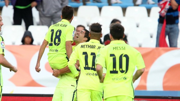 Luis Suarez Celebrates With Jordi Alba after Barca Winner. Image: Miguel Ruiz/ FC Barca