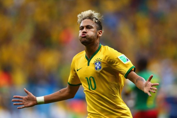 Neymar Celebrates Scoring Against Cameroon at the 2014 World Cup. The Barca Star is Expected in Uyo Next Year. Image: Getty. 