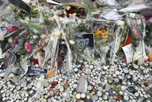 Flowers are placed at the Hyper Cacher kosher supermarket near Porte de Vincennes in eastern Paris