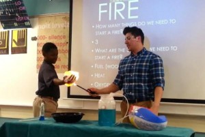 Science-teacher-lights-boys-hand-on-fire-in-methane-demonstration