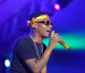 Wizkid Wears Louis Vuitton Rubber Utility Gilet Jacket Worth